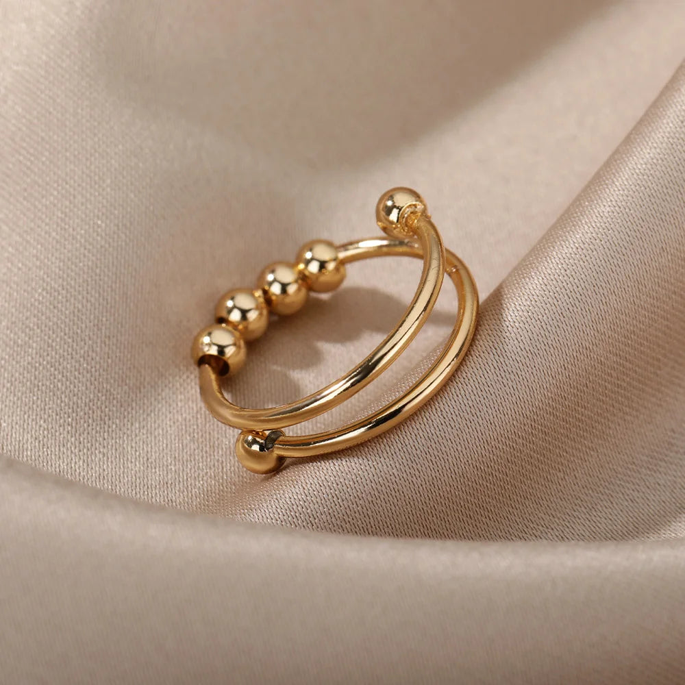 Anillo abierto ajustable de acero inoxidable con cuentas giratorias