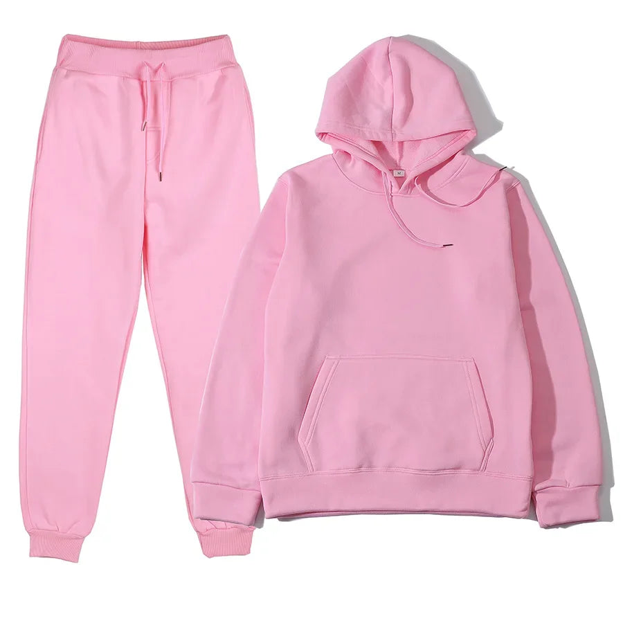 Conjunto de hombre con buzo con capucha y pantalón deportivo