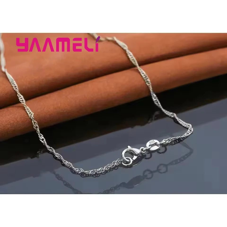 Set de collar con dije y aros de zirconia cúbica