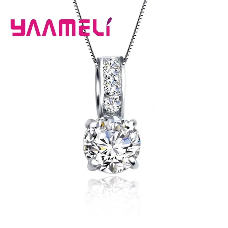 Set de collar con dije y aros de zirconia cúbica