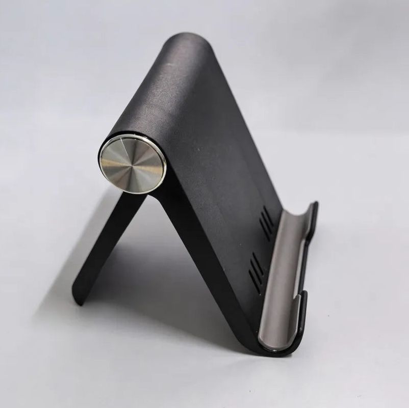 Base plegable con inclinación regulable para celular