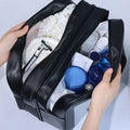 Bolso transparente con compartimentos para higiene personal