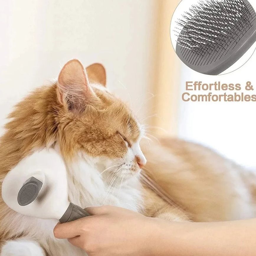 Cepillo para mascotas con botón liberador de pelo