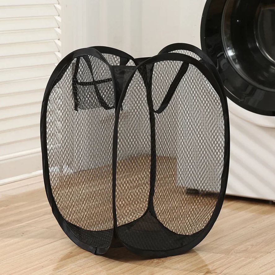 Cesto compacto de malla para ropa y juguetes