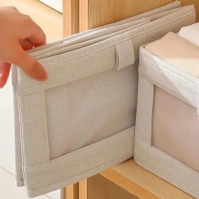 Contenedor de tela plegable para pantalones