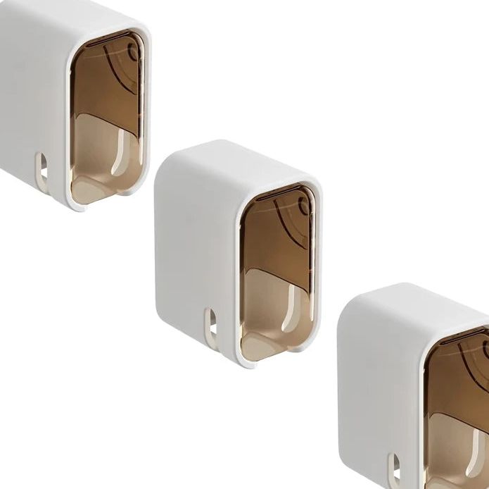 Soportes para cepillos con cubierta abatible