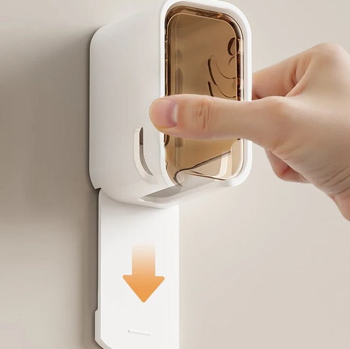 Soportes para cepillos con cubierta abatible