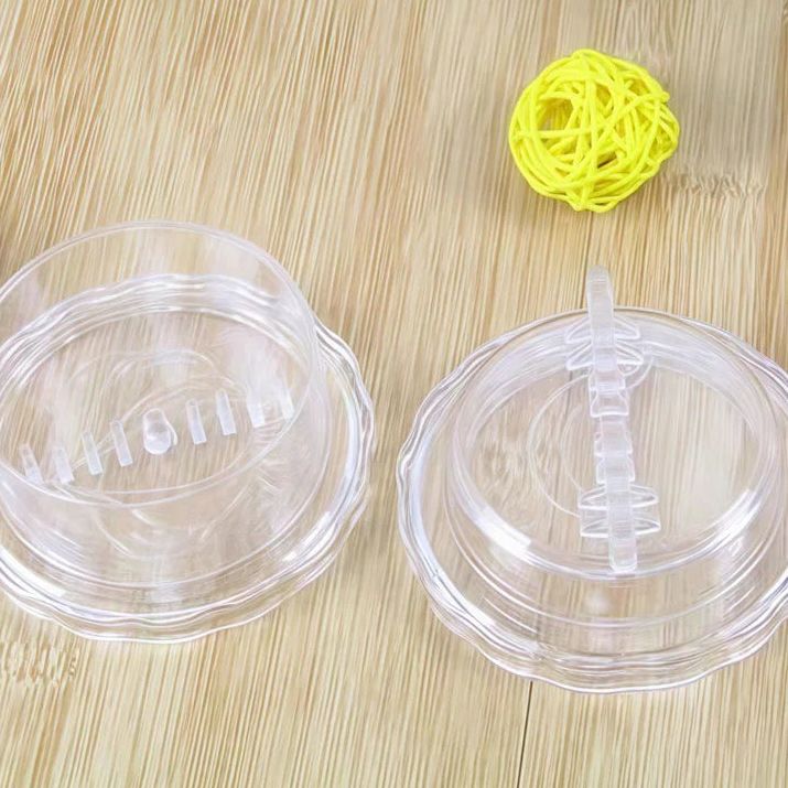 Utensilio plástico para prensar ajo a mano